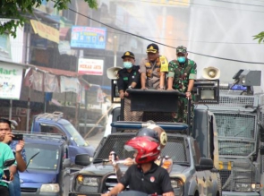 Jajaran Polres Kampar bersama Kodim 0313/Kpr dan Pemkab Lakukan Penyemprotan Desinfektan Serentak