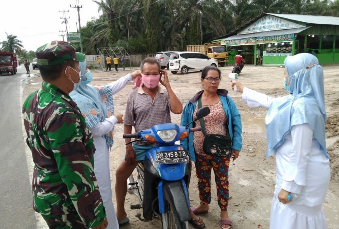 Sinergitas TNI POLRI, Babinsa Koramil 16/Tapung Bersama Bhabinkamtibmas Pantau Pos PSBM
