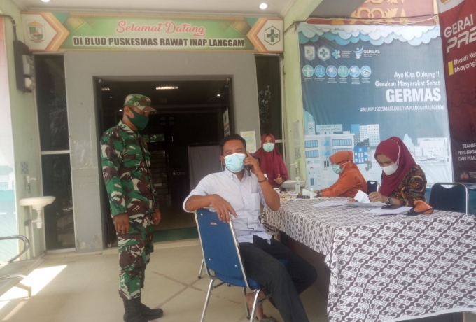 Babinsa Koramil 09/Langgam Monitoring Penerapan Prokes P Pelaksanaan Vaksinasi Covid-19
