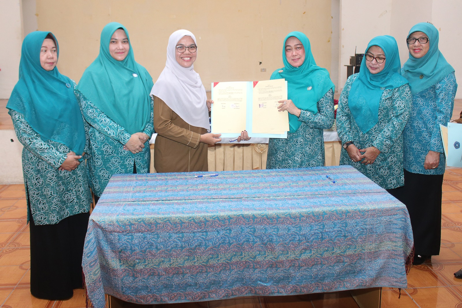 Percepat Keberhasilan Pembangunan Melalui Pemberdayaan Keluarga, TP PKK Siak Teken MoU dengan 13 OPD